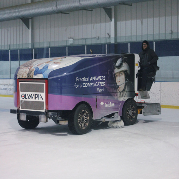 machine cleaning ice rink